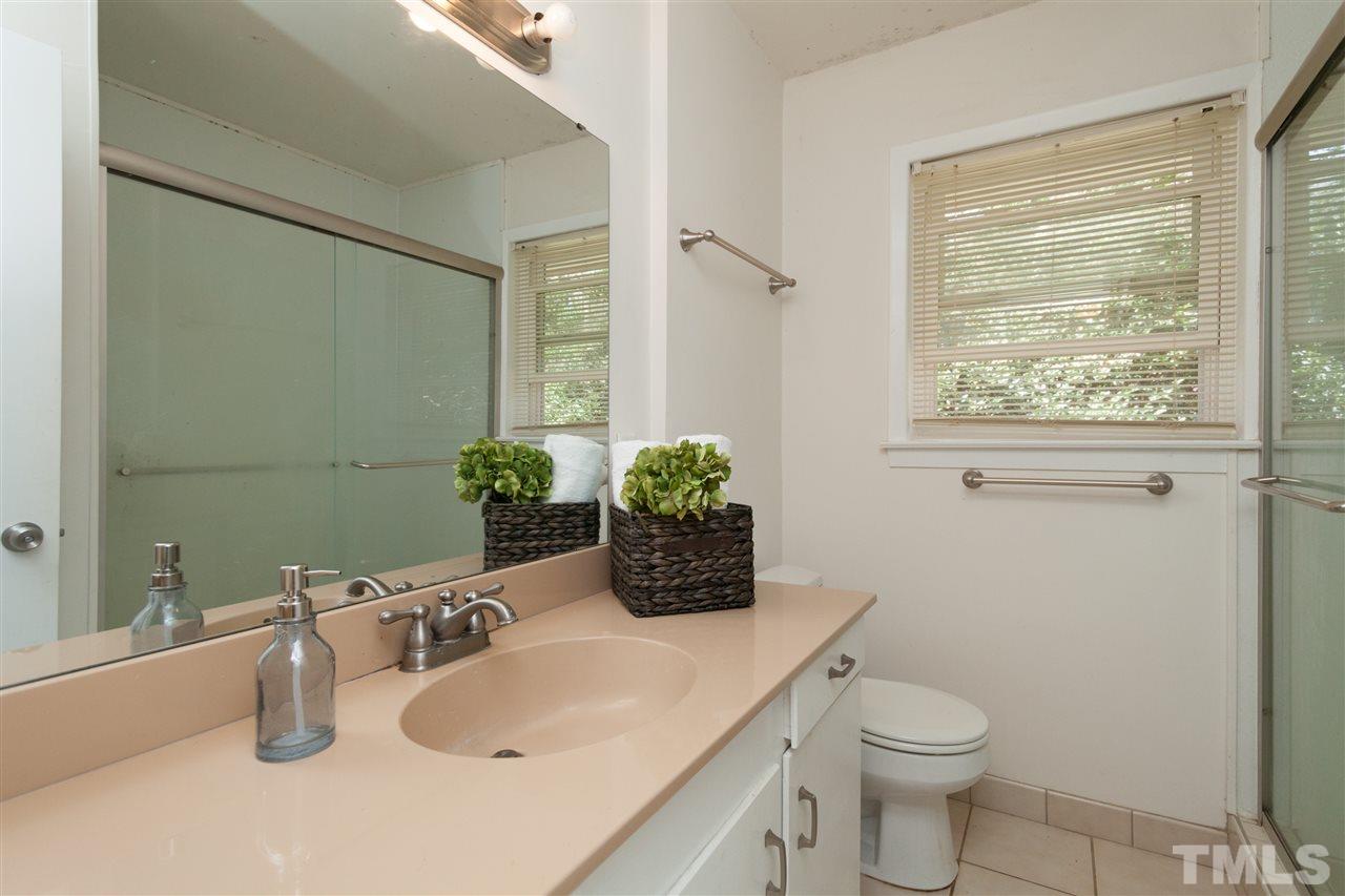 1633 Crump Road Raleigh, NC 27606 - Photo 10 of 19 Hall bath features walk-in shower