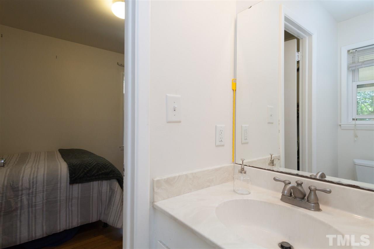 1633 Crump Road Raleigh, NC 27606 - Photo 12 of 19 Access from both the bedroom & utility room