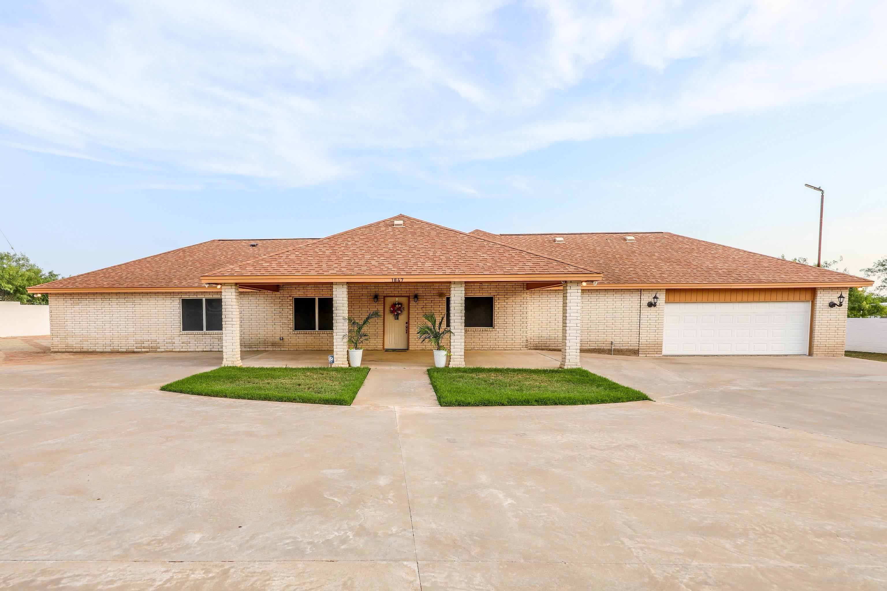 1847 Mangana-Hein Road Laredo, TX 78046 - Photo 1 of 1 front view of a house with yard