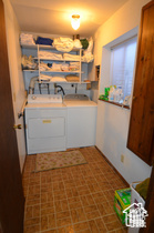 6874 South 595 East Midvale, UT 84047 - Photo 13 of 16 Washroom featuring washer and dryer