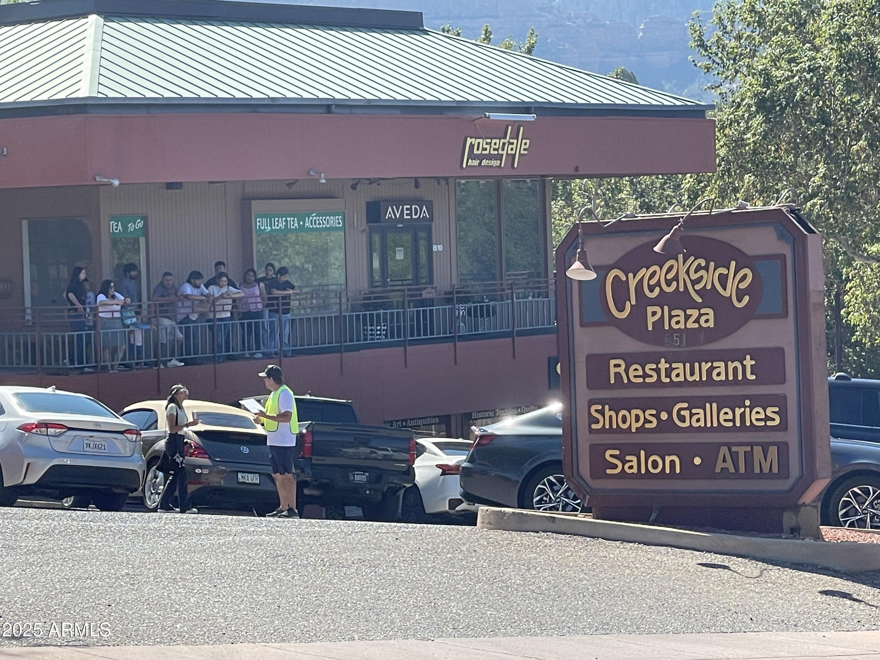 7 Parcels Brewer Road, Unit 6 1317 &CF LOT Sedona, AZ 86336 - Photo 29 of 51 a wooden bench sitting in front of a building