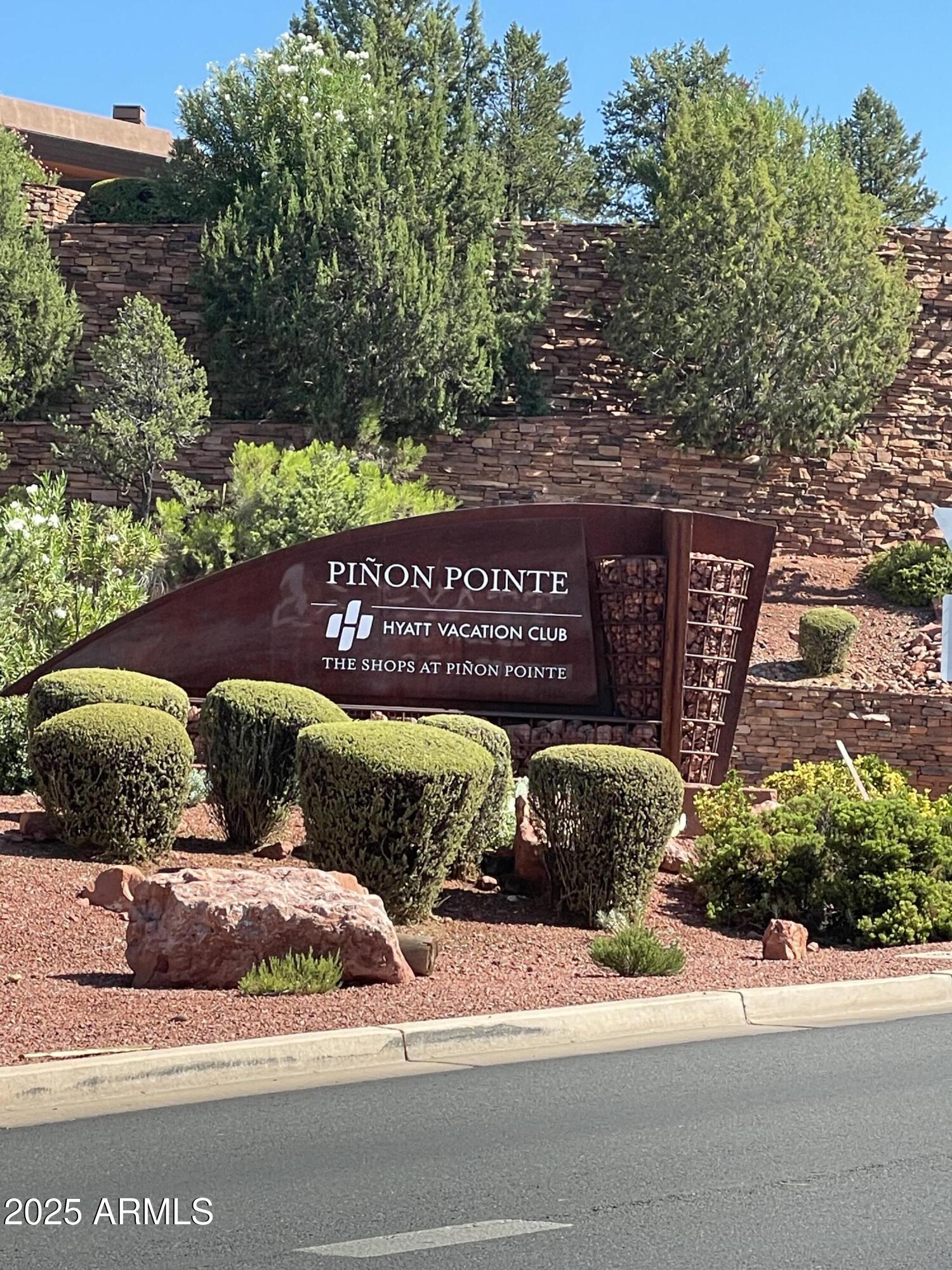 7 Parcels Brewer Road, Unit 6 1317 &CF LOT Sedona, AZ 86336 - Photo 30 of 51 a front view of a building with garden