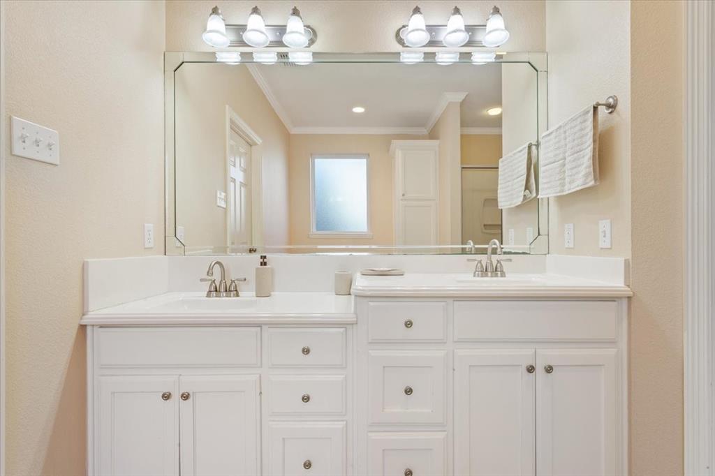5620 Landsdown Drive Waco, TX 76708 - Photo 17 of 37 a bathroom with a sink vanity and mirror