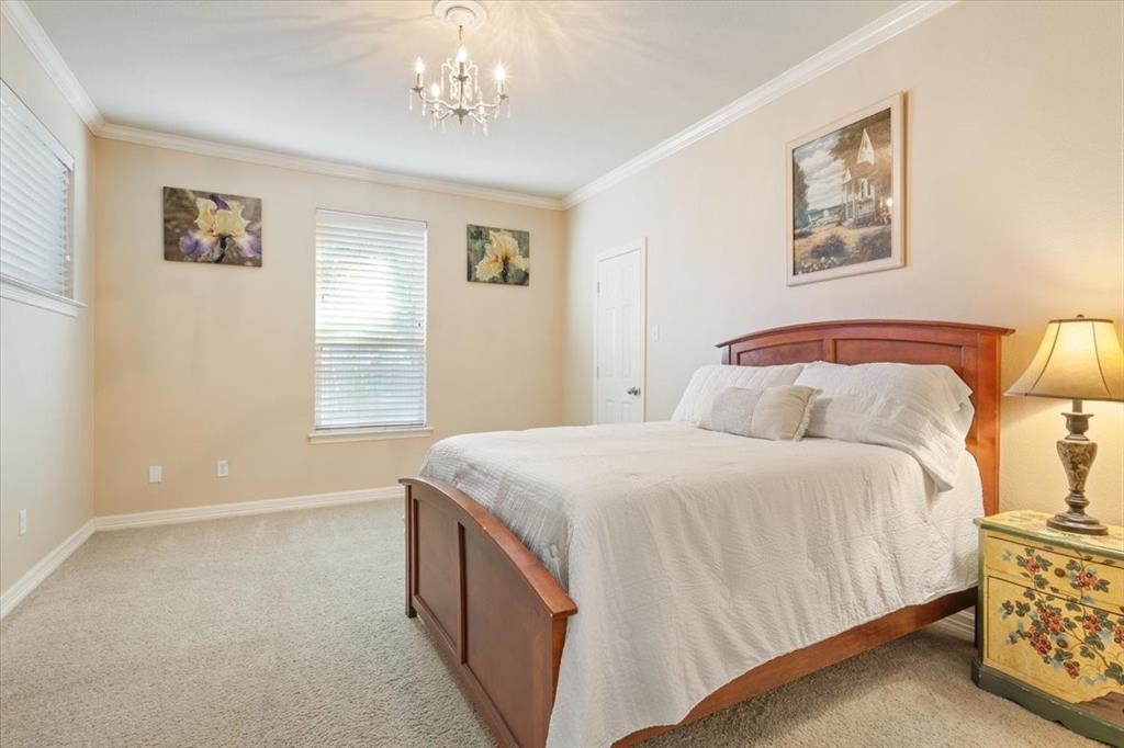 5620 Landsdown Drive Waco, TX 76708 - Photo 24 of 37 a bedroom with a bed and a window