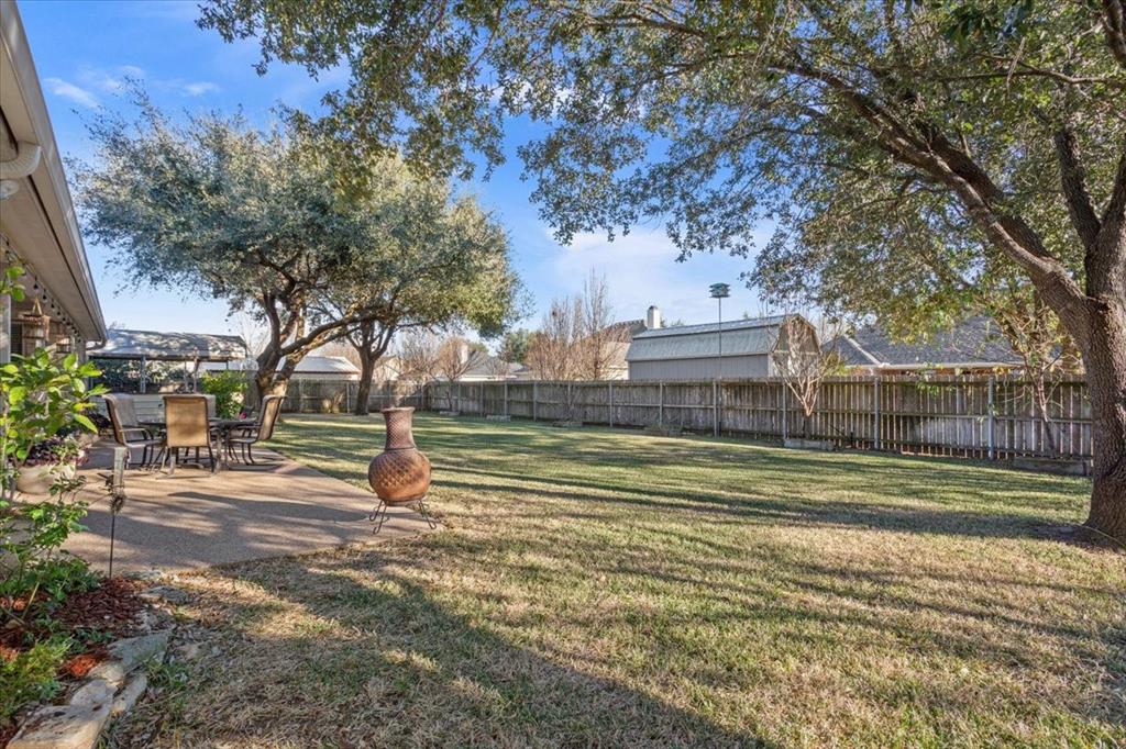 5620 Landsdown Drive Waco, TX 76708 - Photo 30 of 37 a view of a house with a yard