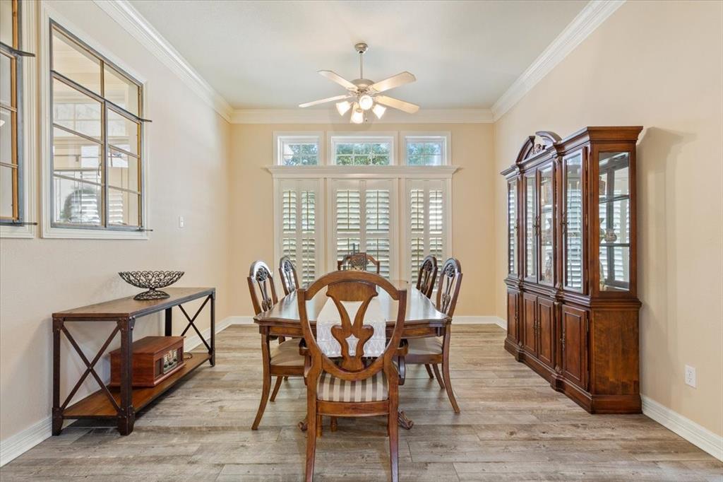 5620 Landsdown Drive Waco, TX 76708 - Photo 6 of 37 a view of a dining room with furniture window and outside view