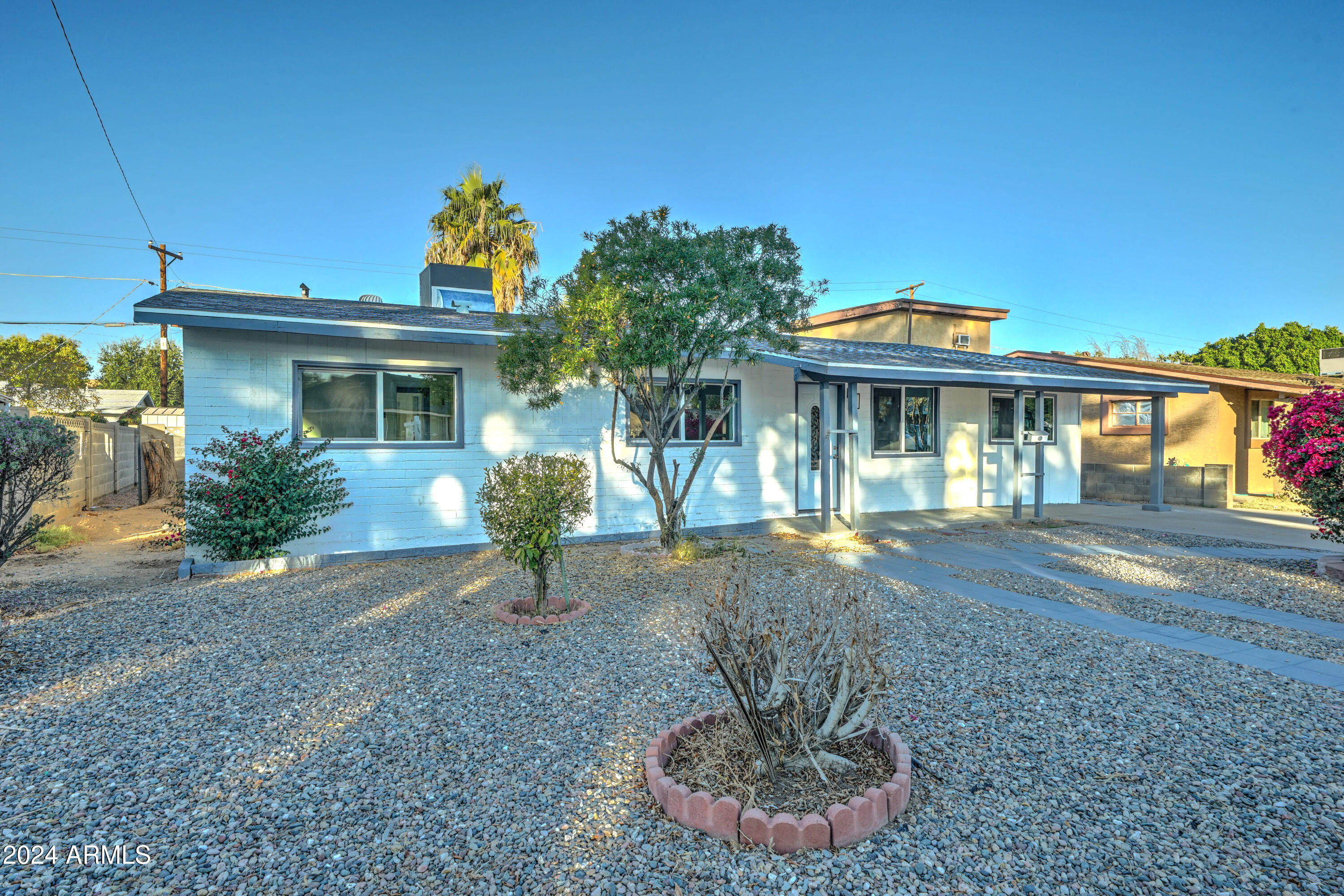 4522 North 14th Avenue Phoenix, AZ 85013 - Photo 2 of 36 a view of a house with a porch