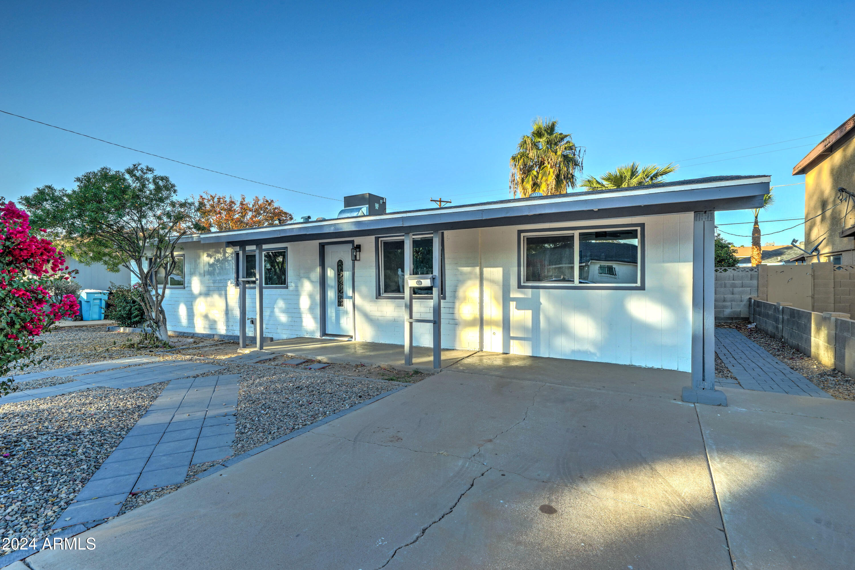 4522 North 14th Avenue Phoenix, AZ 85013 - Photo 3 of 36 a view of a house that has windows