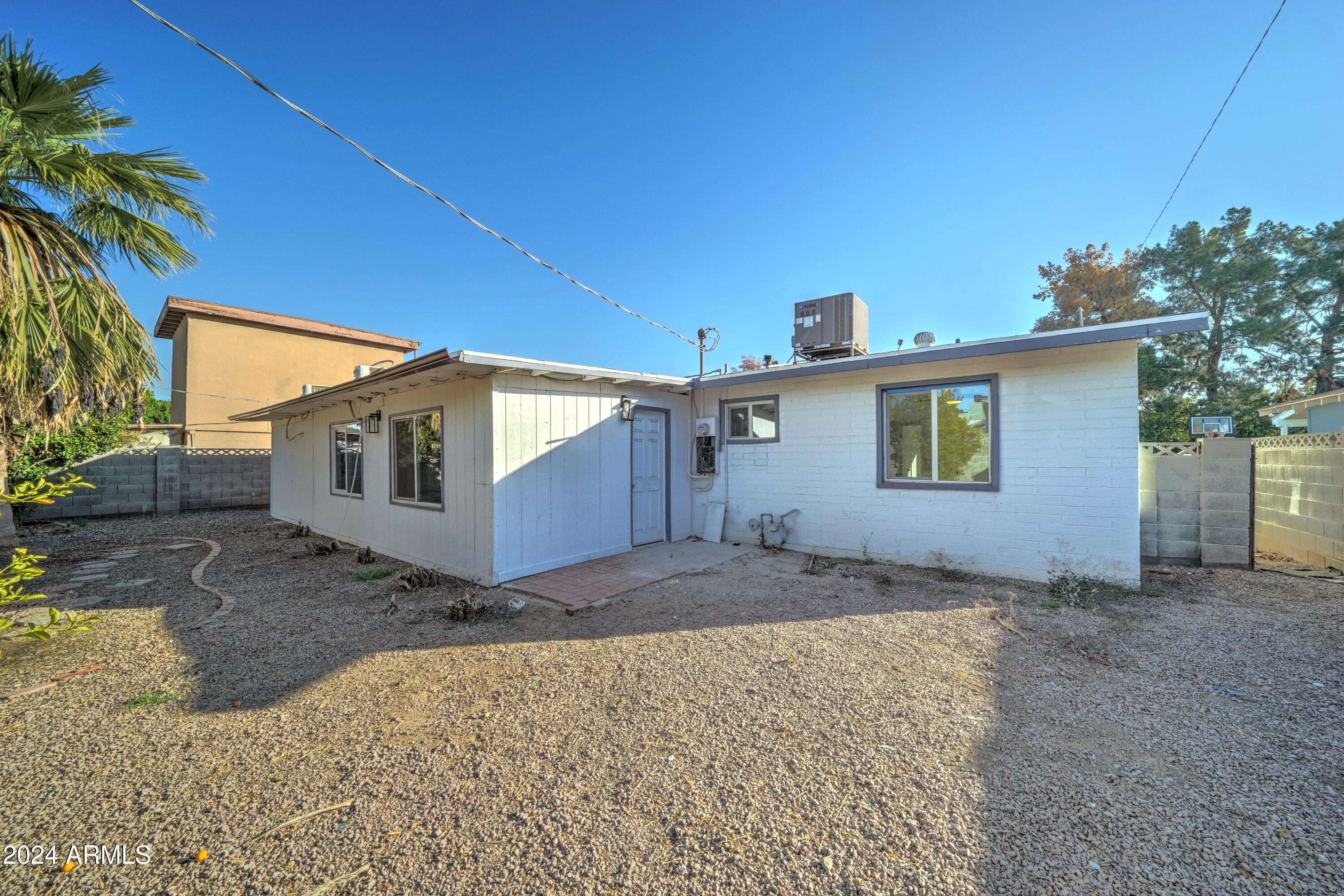 4522 North 14th Avenue Phoenix, AZ 85013 - Photo 35 of 36 a front view of a house with a yard
