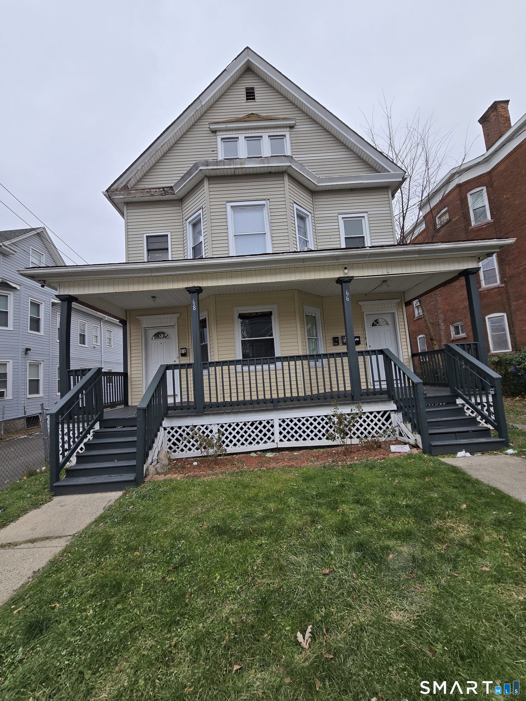 front view of a house with a yard