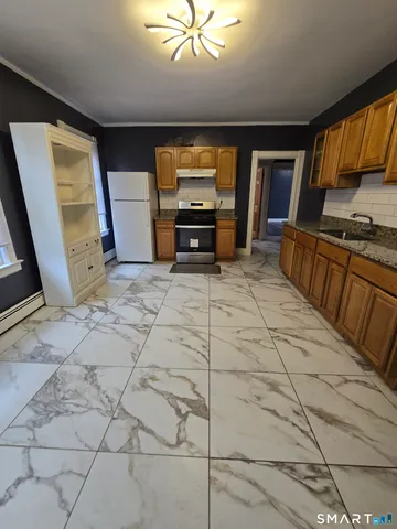 a view of a livingroom with furniture