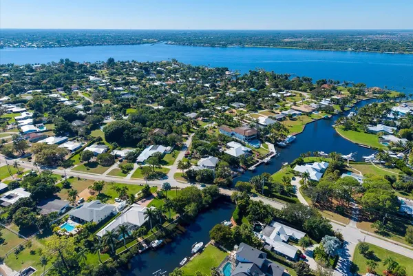 an aerial view of houses with yard
