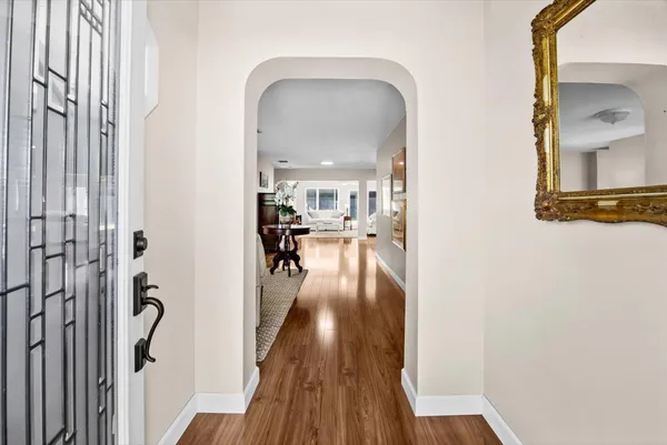 a view of a living room and a livingroom with furniture