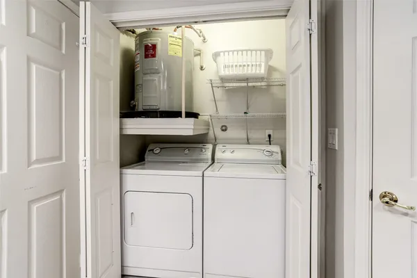 a utility room with dryer and washer