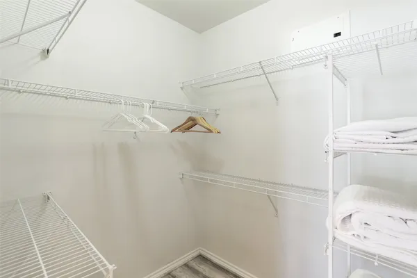 a view of a room with racks on the wall