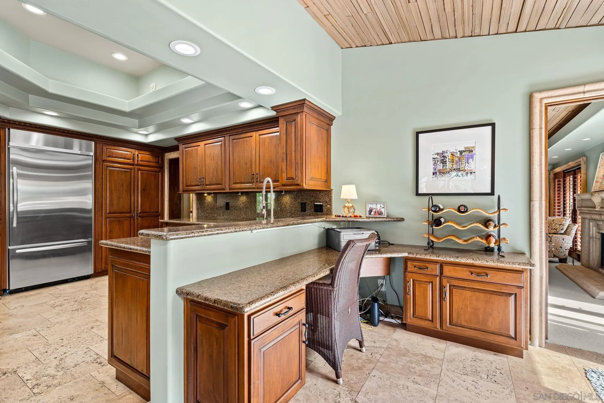 2969 Racetrack View Drive Del Mar, CA 92014 - Photo 19 of 59 a kitchen with stainless steel appliances granite countertop a stove and a sink