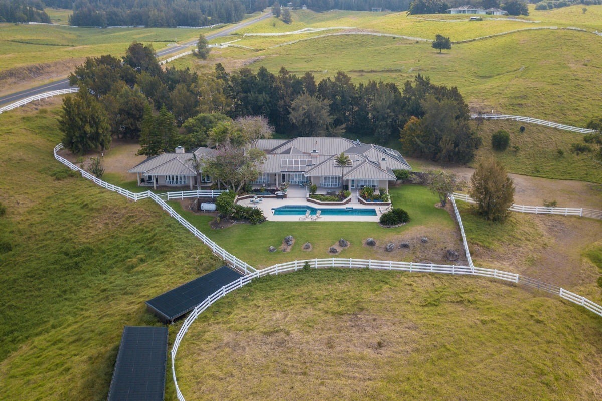 a view of a swimming pool with an ocean view