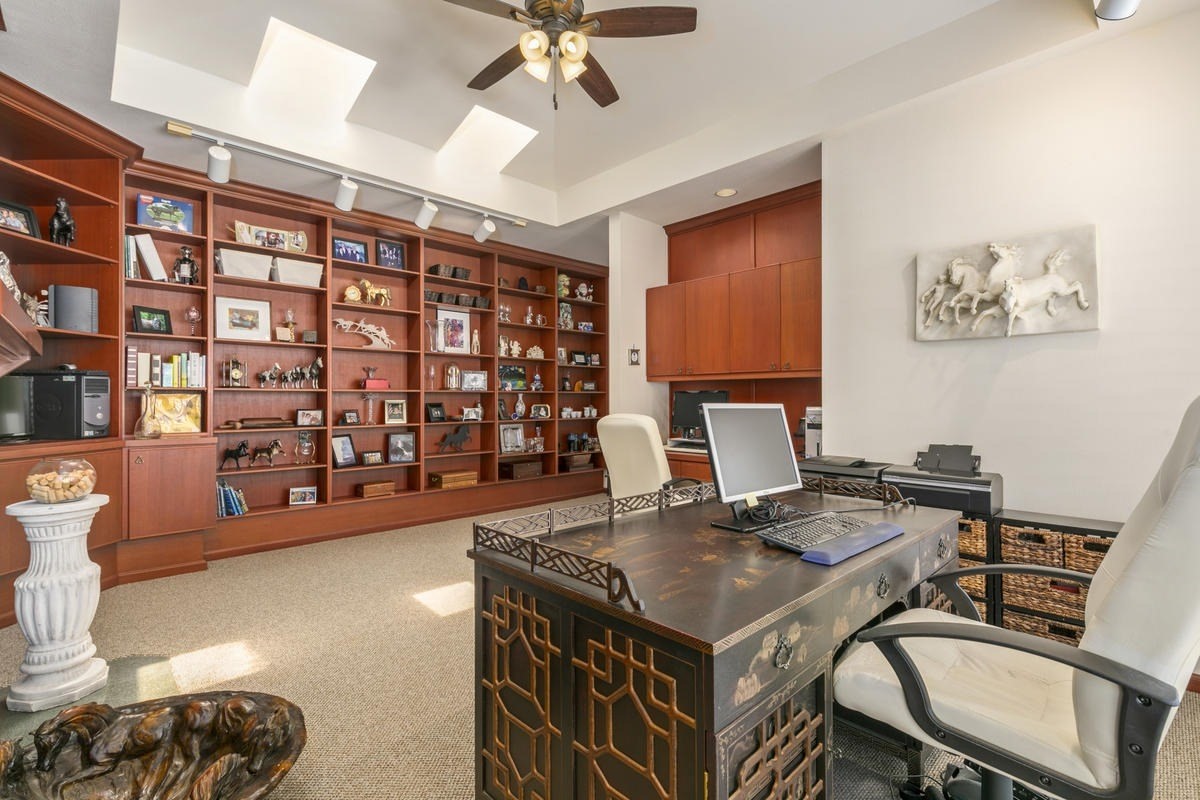 59-1764 Kohala Ranch Road Kamuela, HI 96743 - Photo 11 of 30 a living room with a couch and a chandelier