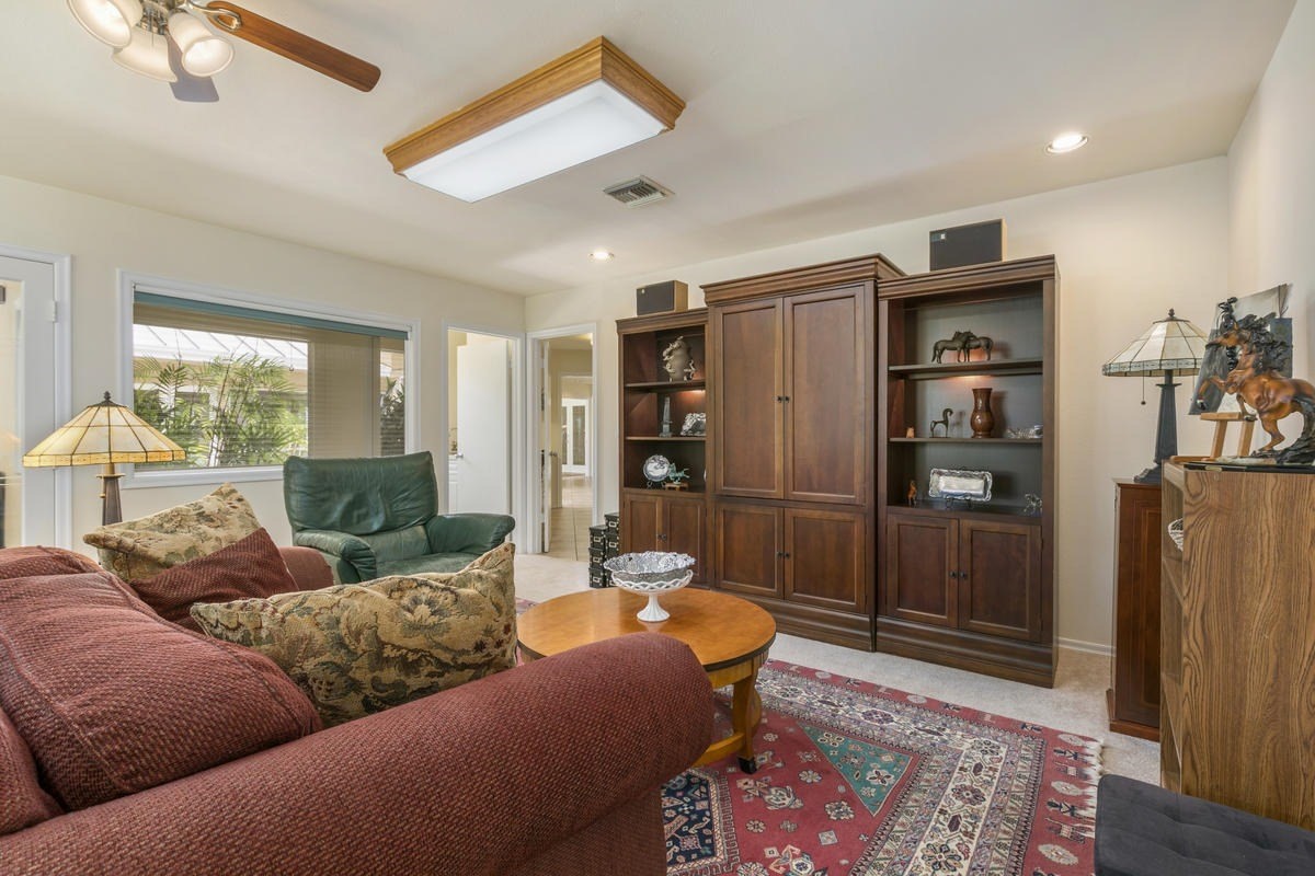59-1764 Kohala Ranch Road Kamuela, HI 96743 - Photo 16 of 30 a living room with furniture and a rug