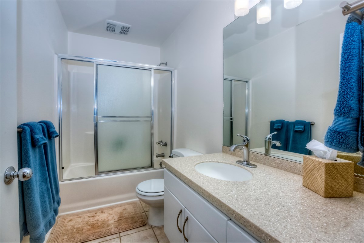 59-1764 Kohala Ranch Road Kamuela, HI 96743 - Photo 18 of 30 a bathroom with a granite countertop sink toilet and shower