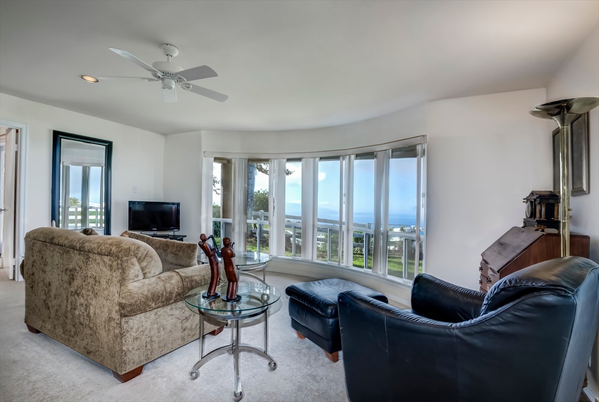 59-1764 Kohala Ranch Road Kamuela, HI 96743 - Photo 28 of 30 a living room with furniture and a flat screen tv