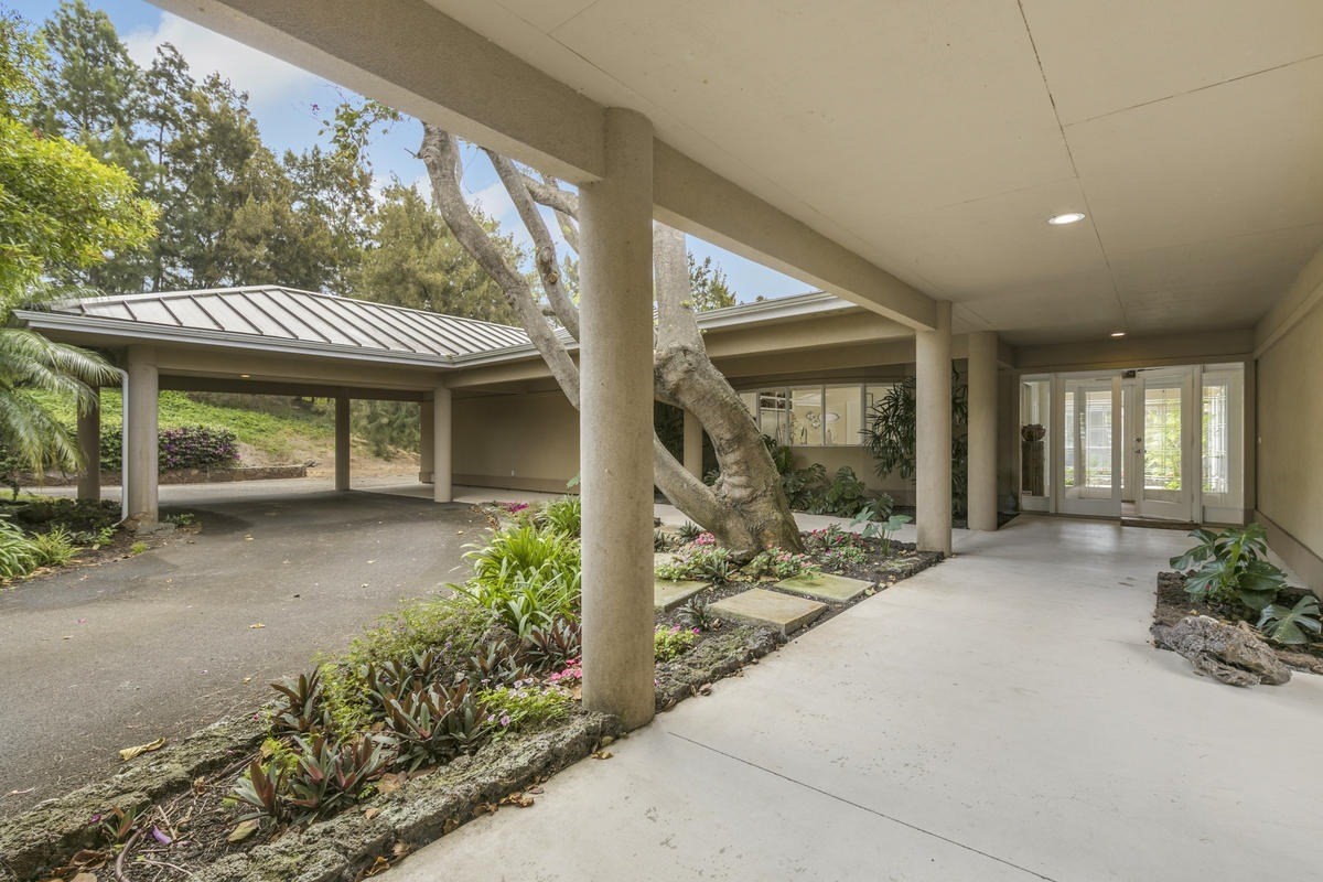 59-1764 Kohala Ranch Road Kamuela, HI 96743 - Photo 6 of 30 a view of a house with porch and garden