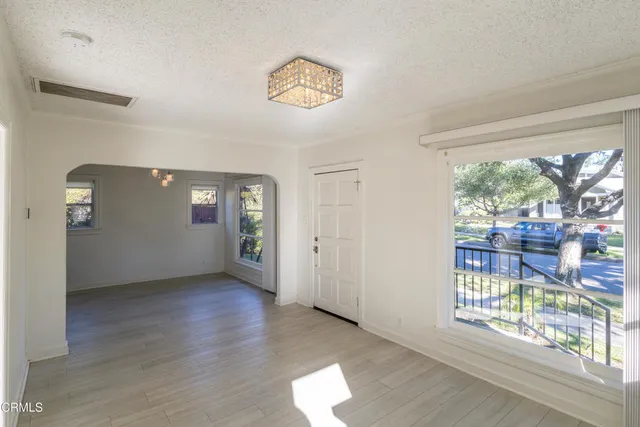 a view of an empty room and window