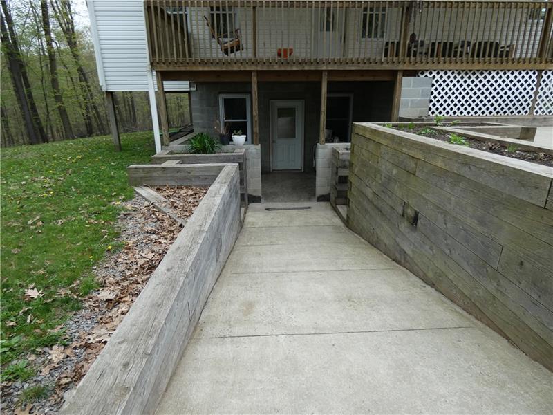 253 Cokain Road Harrisville, PA 16038 - Photo 19 of 25 Walk out basement with a large ramp
