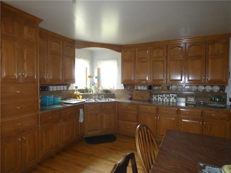 253 Cokain Road Harrisville, PA 16038 - Photo 10 of 25 Oak cabinets in the kitchen