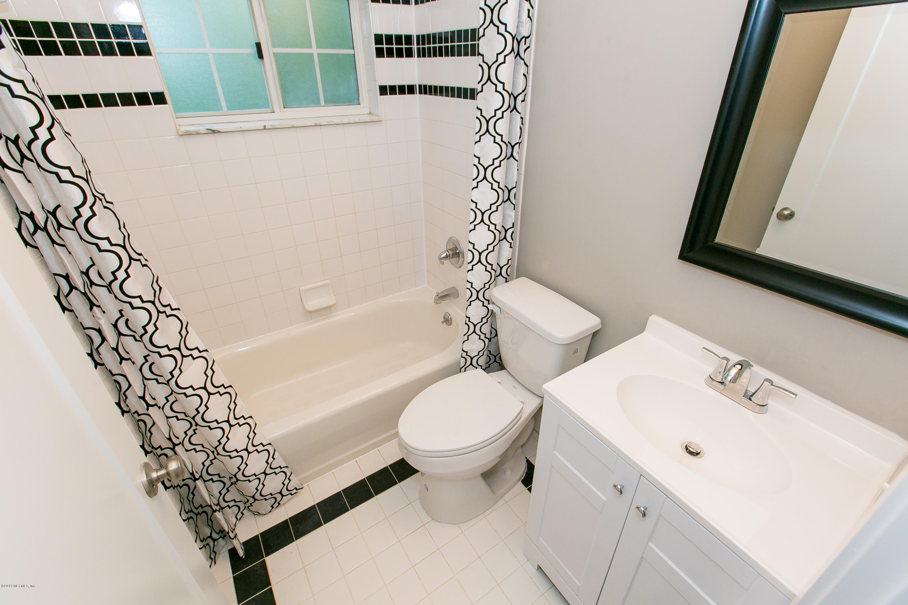 2225 Pacetti Road St. Augustine, FL 32092 - Photo 28 of 42 a bathroom with a sink a toilet and shower