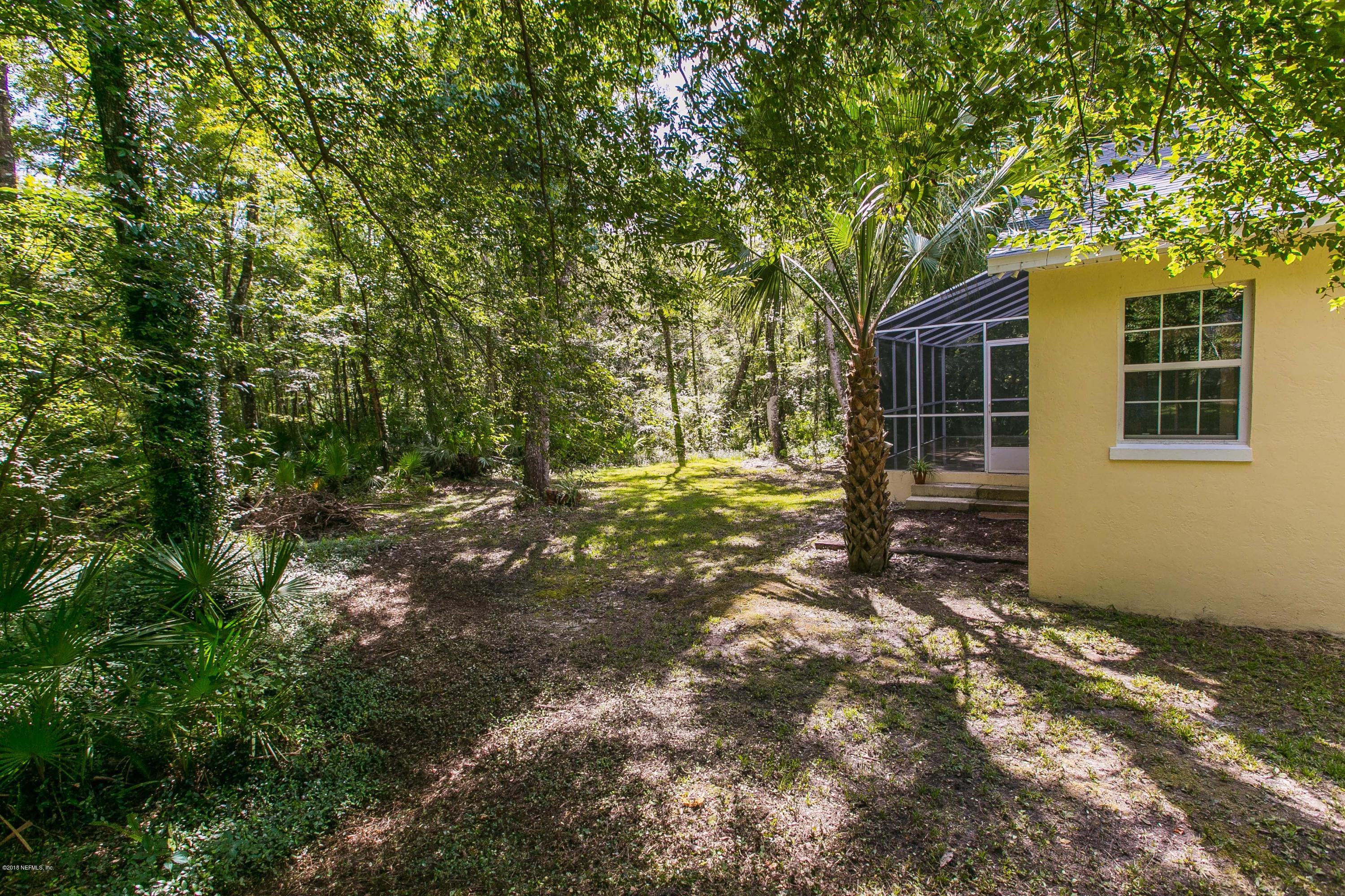 2225 Pacetti Road St. Augustine, FL 32092 - Photo 37 of 42 a backyard of a house with lots of green space