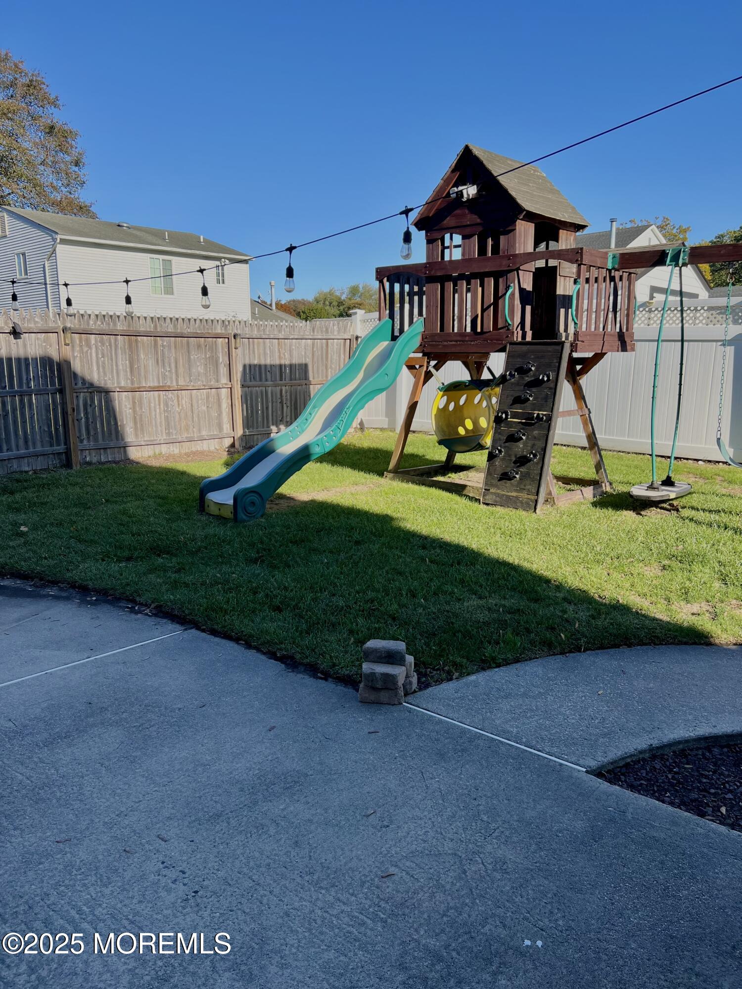 8 Hedgewood Road Howell, NJ 07731 - Photo 13 of 17 a view of a house with a yard and sitting area