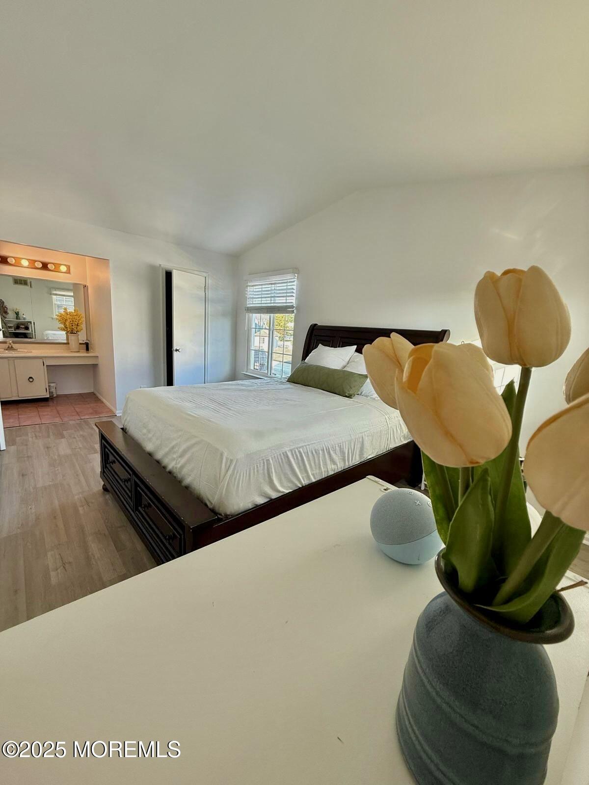 8 Hedgewood Road Howell, NJ 07731 - Photo 16 of 17 a bedroom with a bed and lamp