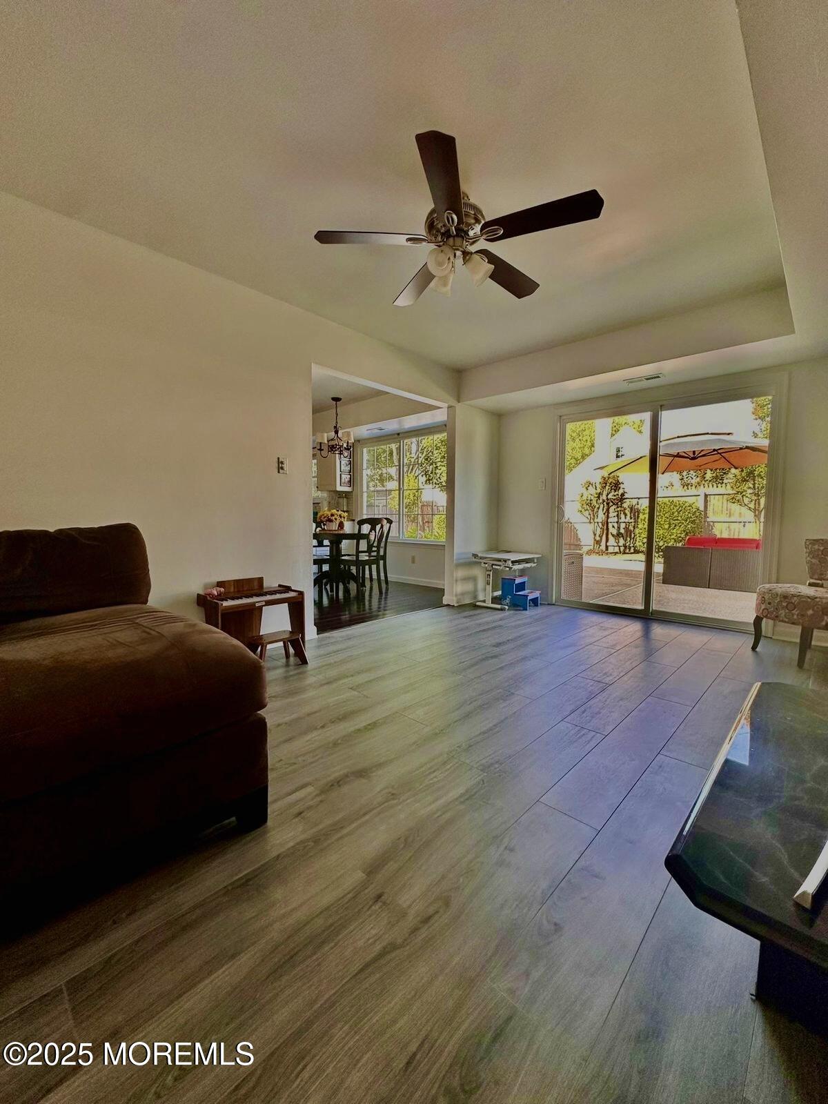 8 Hedgewood Road Howell, NJ 07731 - Photo 4 of 17 a living room with furniture and a large window