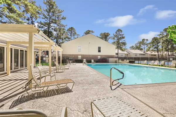a view of a backyard with a patio