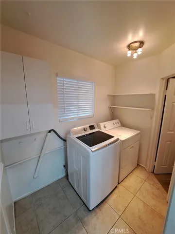 a bathroom with a toilet a sink and a mirror
