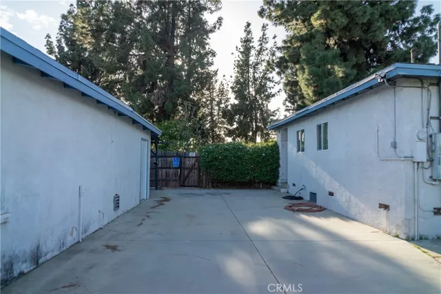a view of a livingroom with an empty space and a fireplace