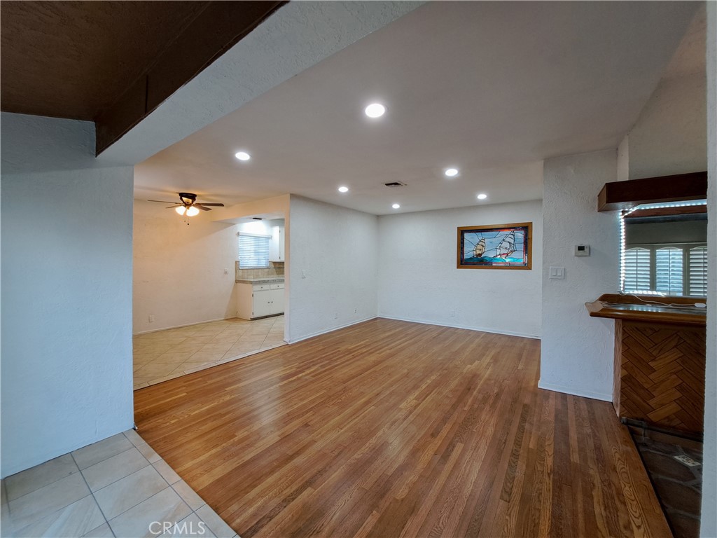20121 Comanche Avenue Winnetka, CA 91306 - Photo 10 of 59 a view of empty room with wooden floor and fan