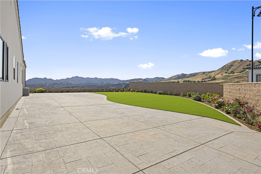 12545 North Silver Spur Court Porter Ranch, CA 91326 - Photo 20 of 22 a view of a swimming pool and lake view