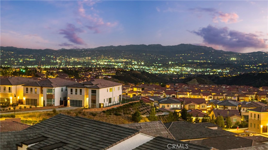 12545 North Silver Spur Court Porter Ranch, CA 91326 - Photo 4 of 22 a view of a city with tall buildings
