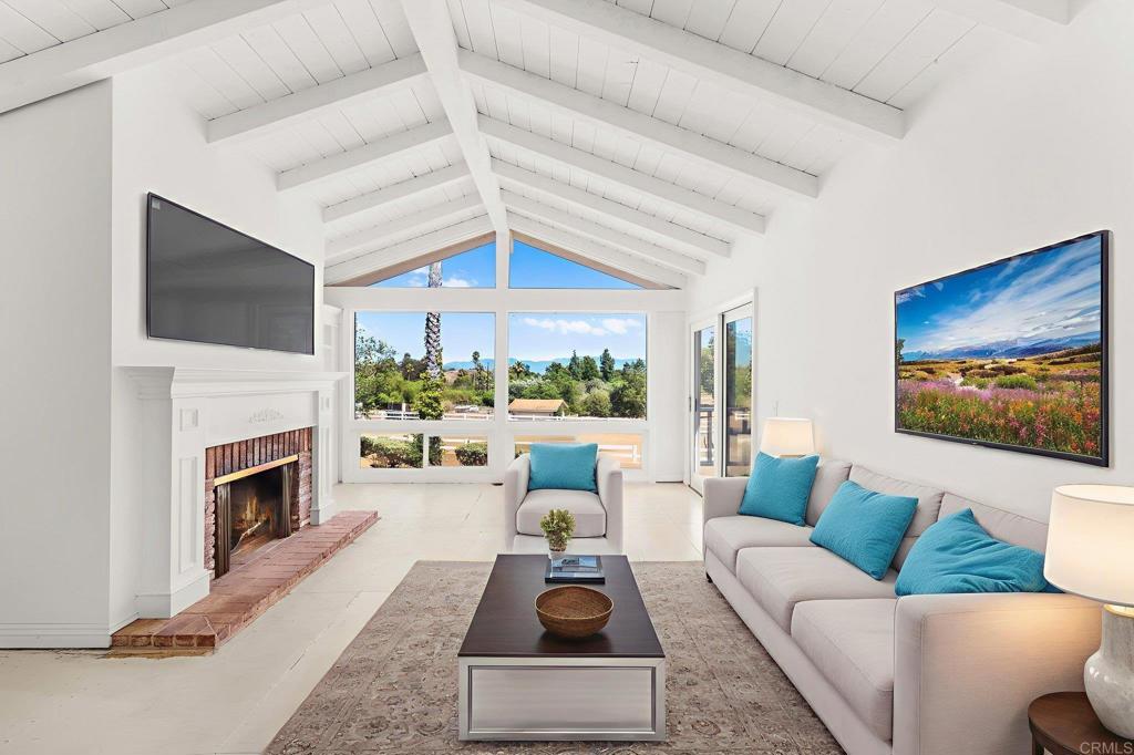 758 Verde Avenue Fallbrook, CA 92028 - Photo 17 of 71 a living room with furniture fireplace and flat screen tv
