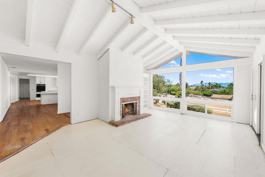 758 Verde Avenue Fallbrook, CA 92028 - Photo 18 of 71 a view of a livingroom with an empty space and a fireplace