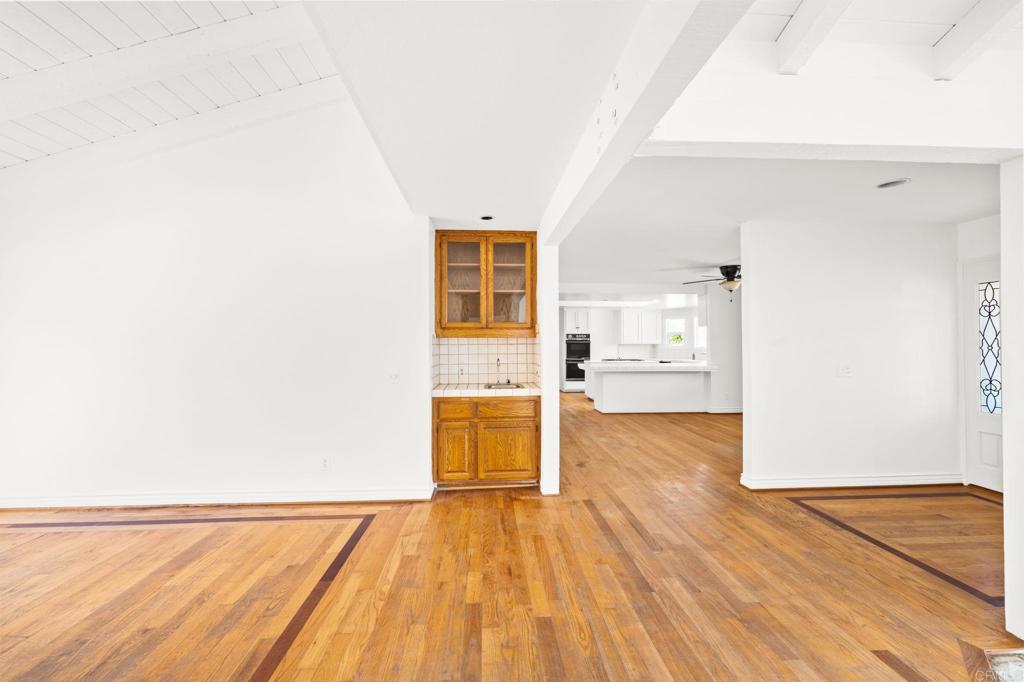 758 Verde Avenue Fallbrook, CA 92028 - Photo 23 of 71 a view of a kitchen with wooden floor and a sink