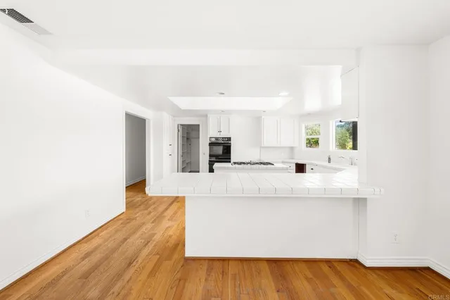 a view of a swimming pool with a lounge chairs