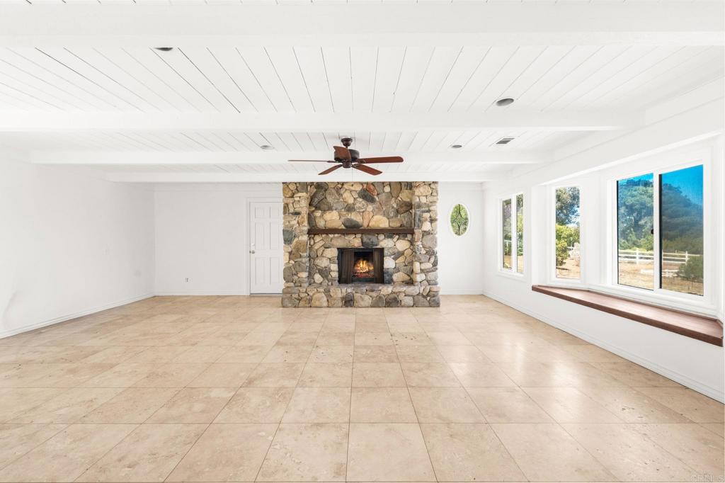758 Verde Avenue Fallbrook, CA 92028 - Photo 48 of 71 a view of an empty room with a fireplace