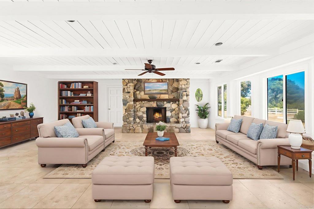 758 Verde Avenue Fallbrook, CA 92028 - Photo 49 of 71 a living room with furniture and a chandelier