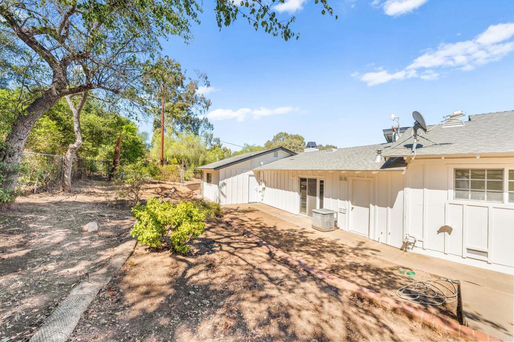 758 Verde Avenue Fallbrook, CA 92028 - Photo 52 of 71 a front view of a house with a yard