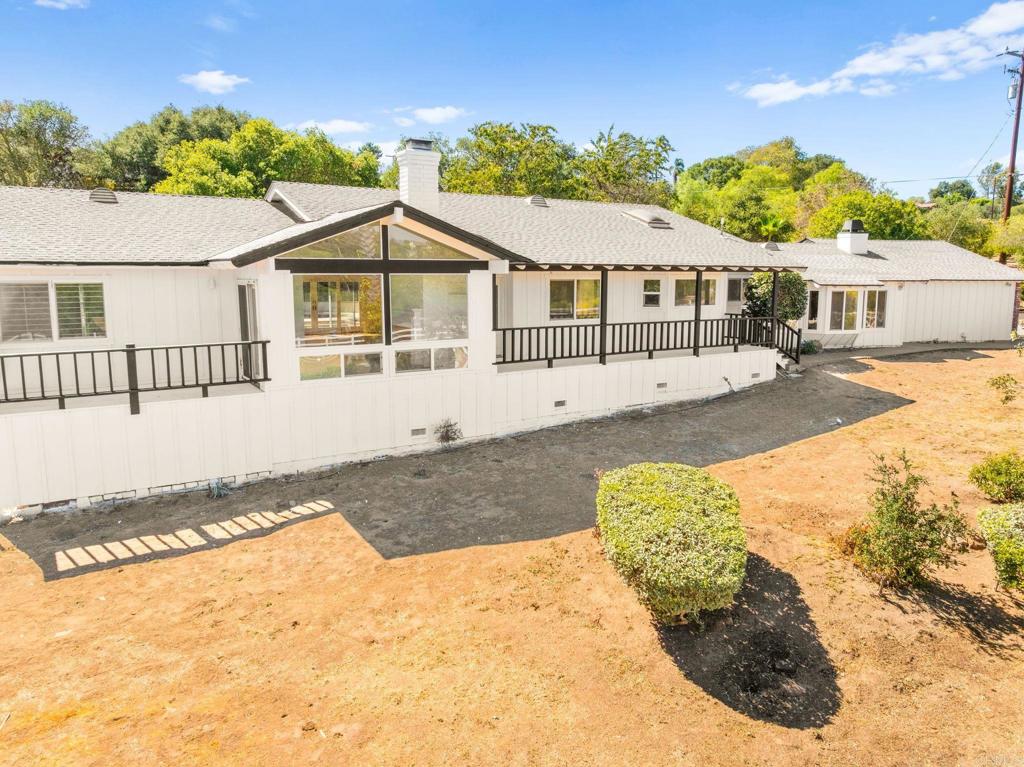 758 Verde Avenue Fallbrook, CA 92028 - Photo 9 of 71 a front view of a house with a yard