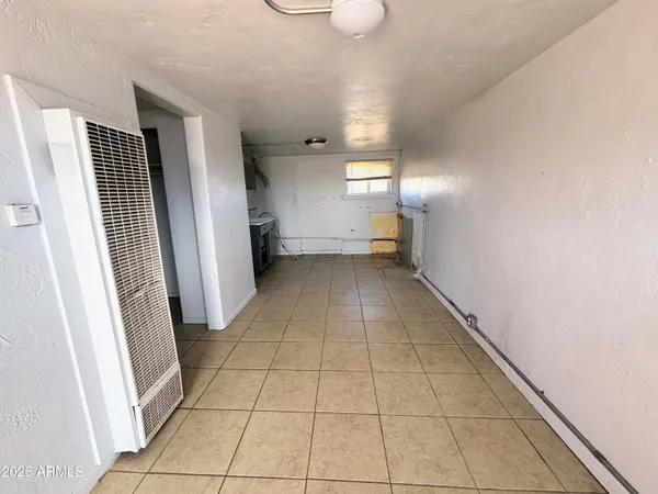 a view of a livingroom with a staircase