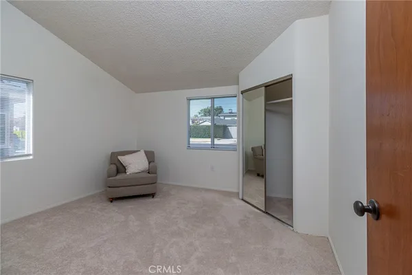 a view of livingroom with furniture and window